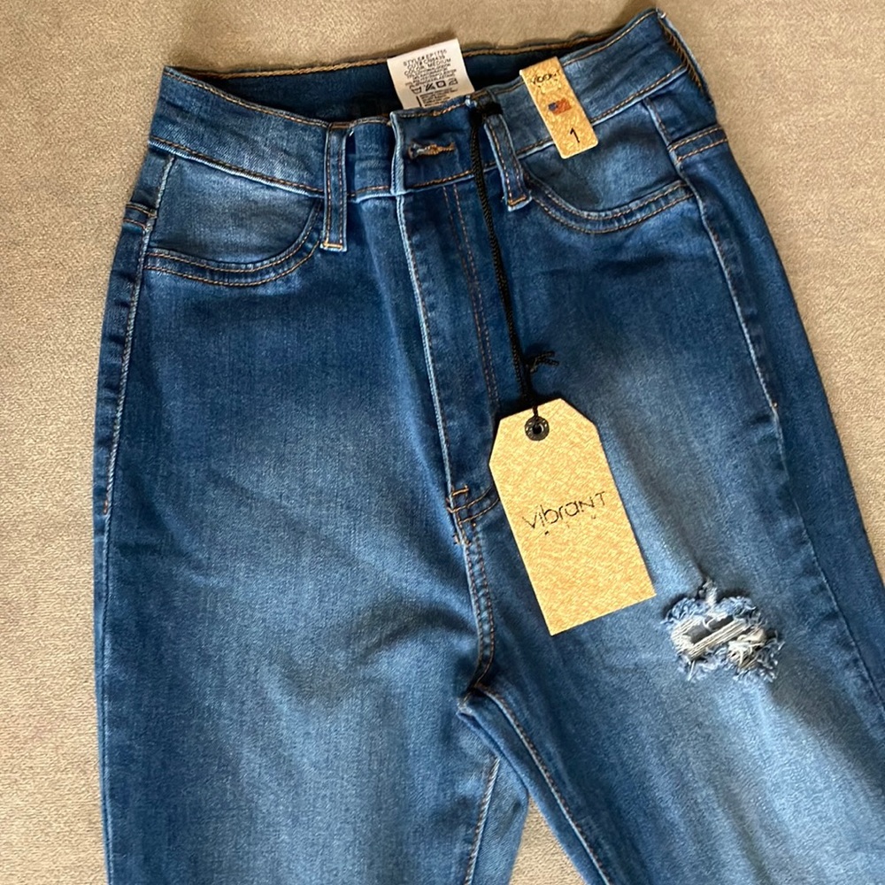 Punchy blonde vibrant medium wash flare/bell bottom jeans